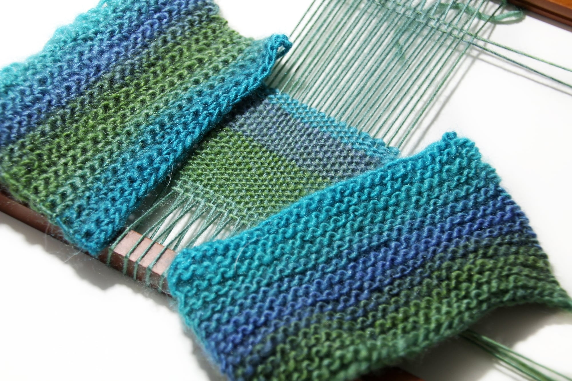 The Difference Between Weaving, Knitting, and Crochet Warped Fibers