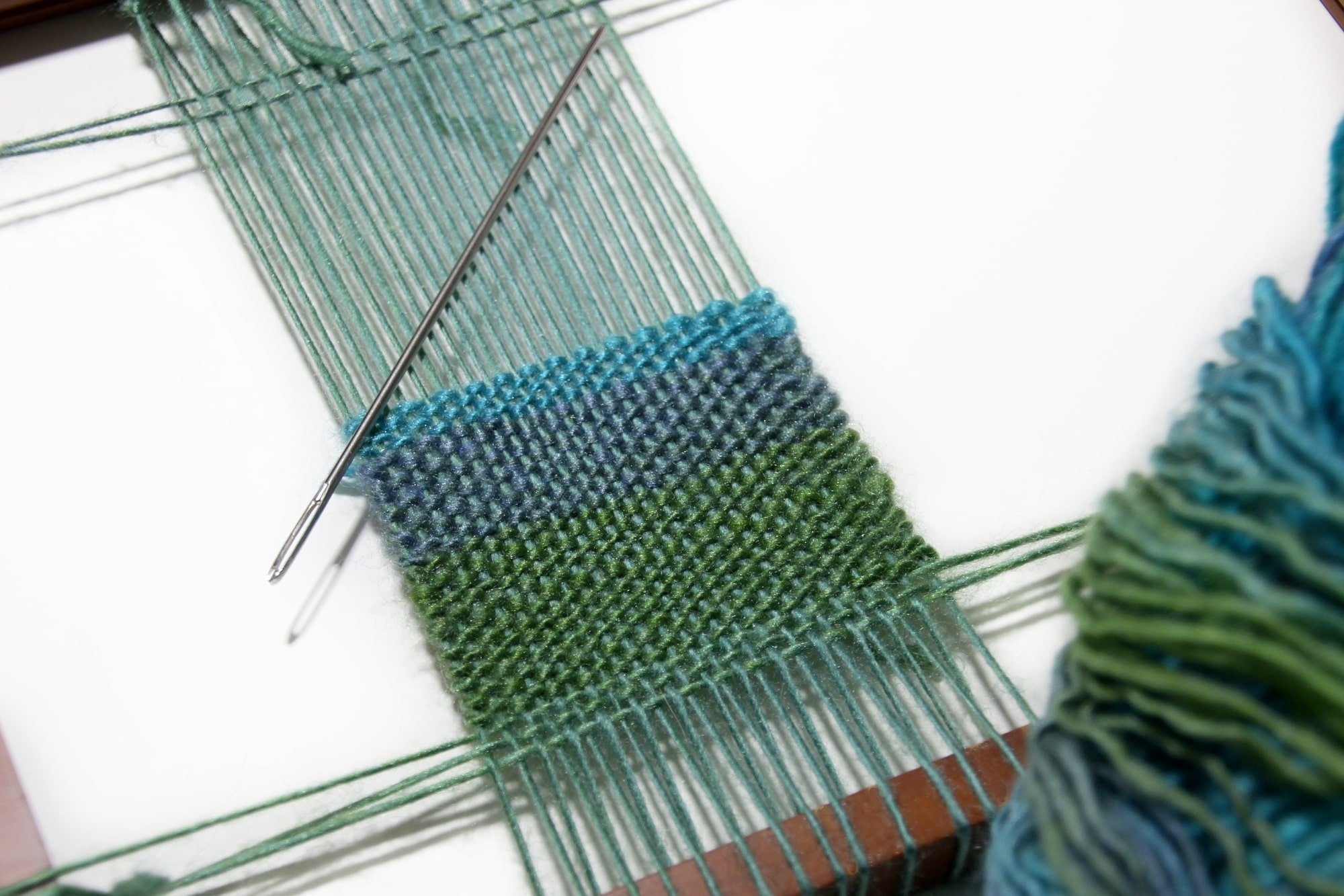 The Difference Between Weaving, Knitting, and Crochet Warped Fibers